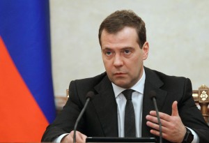 Russian Prime Minister Dmitry Medvedev chairs a Cabinet meeting in Moscow, Russia, on Thursday, Feb. 7, 2013.  Medvedev said he has no immediate intention of reversing his decision to leave Russia on Summer Time all year-round.  Medvedev ruled in 2011 that Russia would remain permanently fixed on Summer Time, but the rule has proved widely unpopular and President Putin has indicated that he may reverse the decision. (AP Photo/RIA-Novosti, Dmitry Astakhov, Government Press Service)
